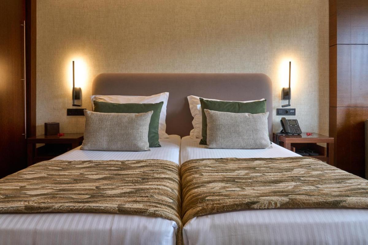 Uma cama ou camas num quarto em H2otel Congress & Medical SPA