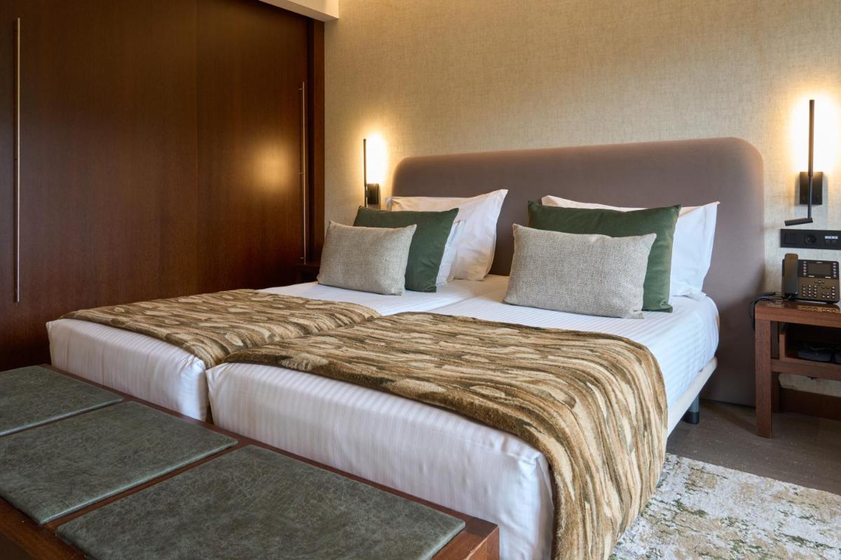 Uma cama ou camas num quarto em H2otel Congress & Medical SPA