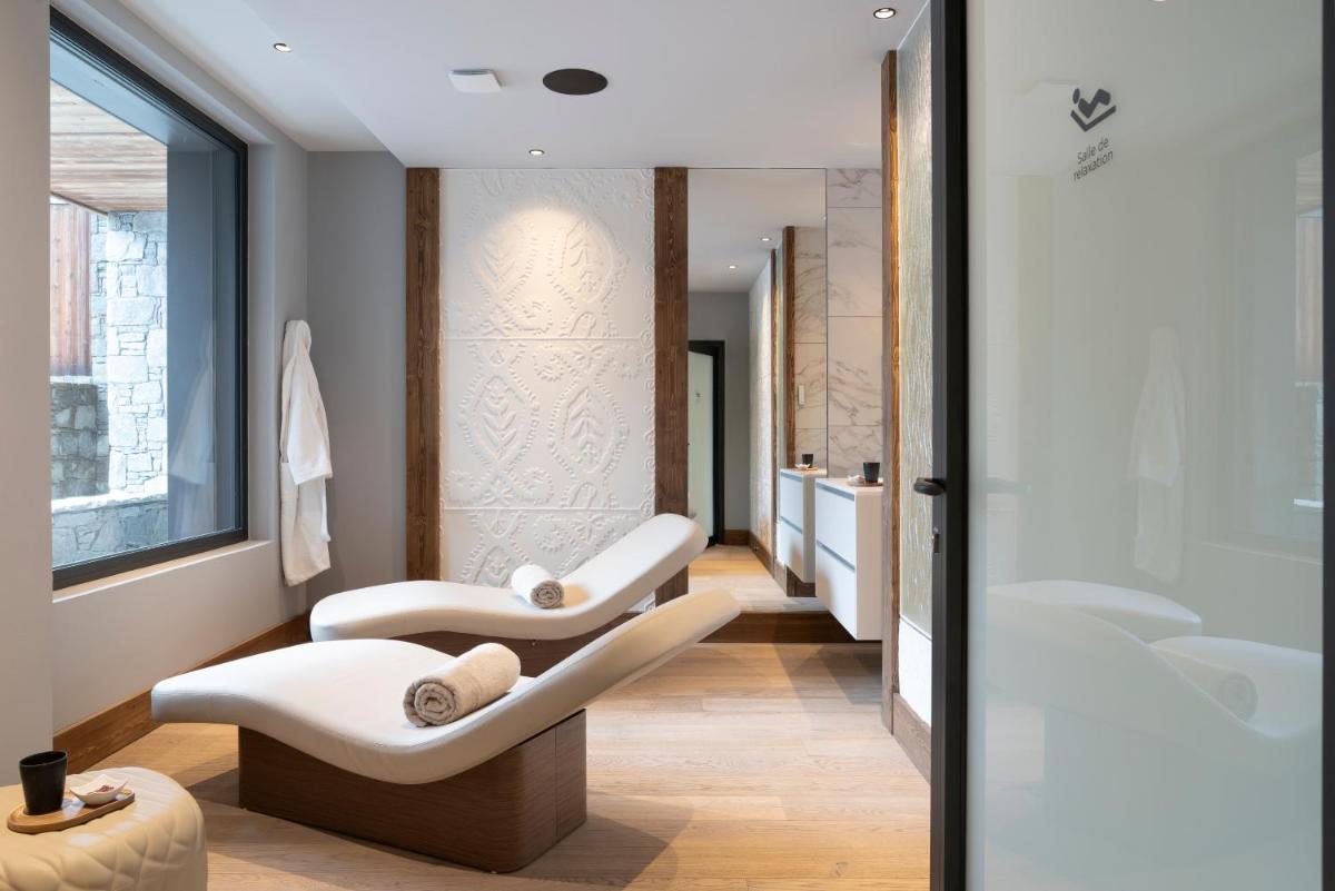 Coin salon dans l'établissement MGM Hôtels & Résidences - Résidence Chalets Laska