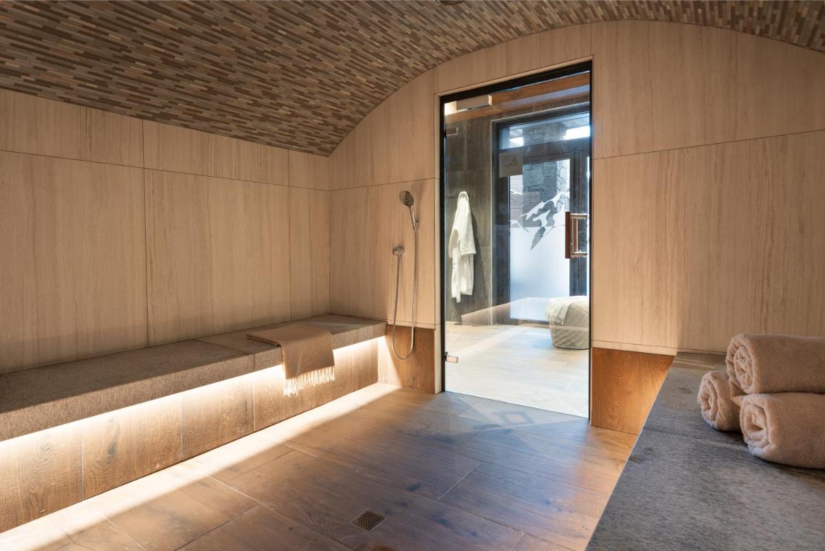 Coin salon dans l'établissement MGM Hôtels & Résidences - Résidence Chalets Laska