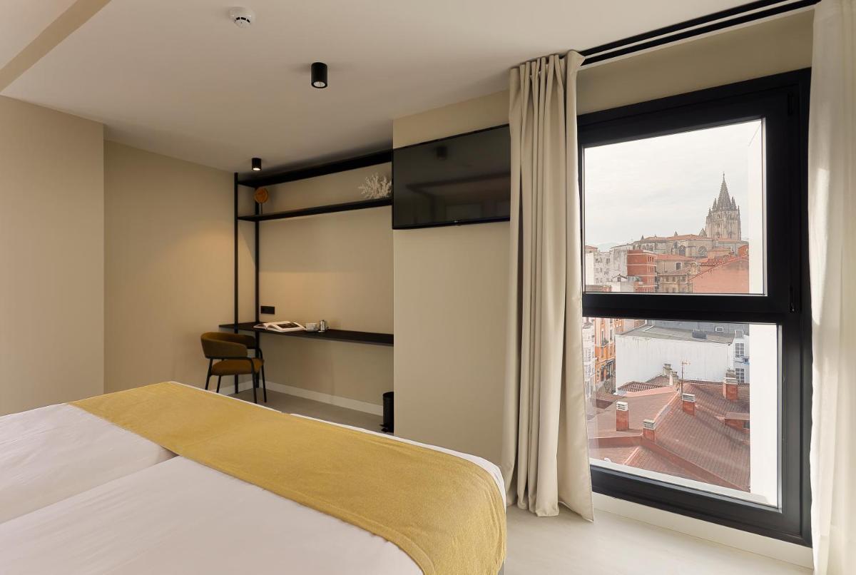 Cama o camas de una habitación en Nuvō Hotel Boutique