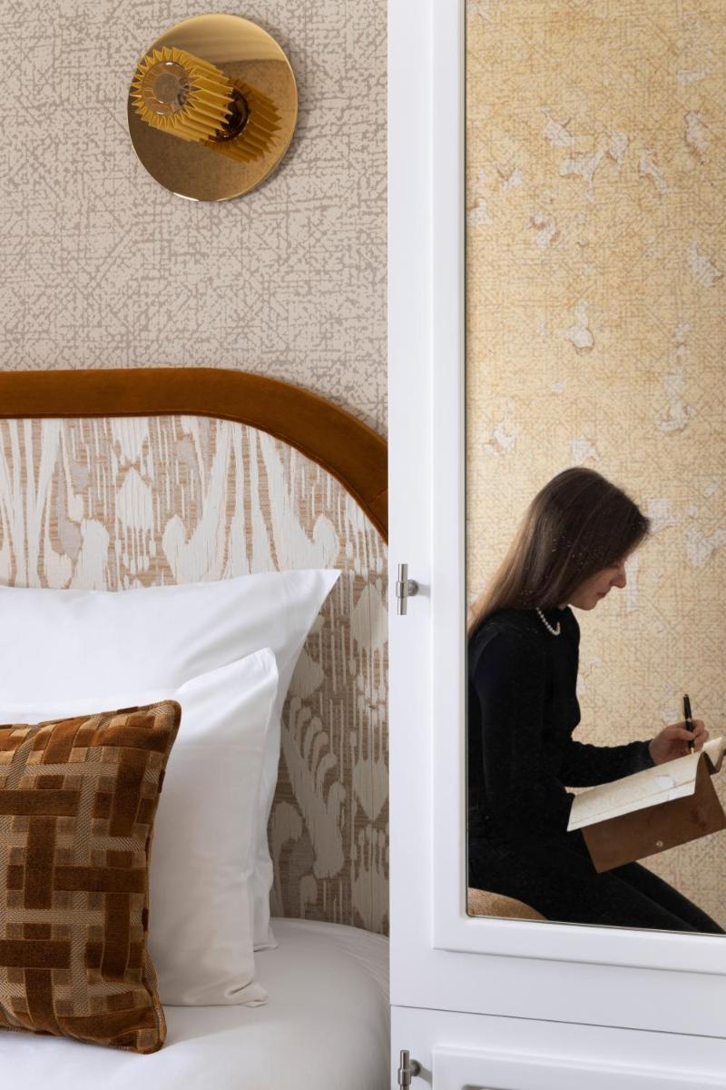 Un ou plusieurs lits dans un hébergement de l'établissement Hotel des Carmes by Malone
