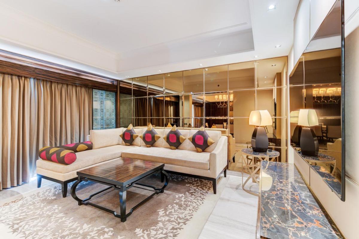 a living room with a couch and a table at Hyatt Ahmedabad in Ahmedabad