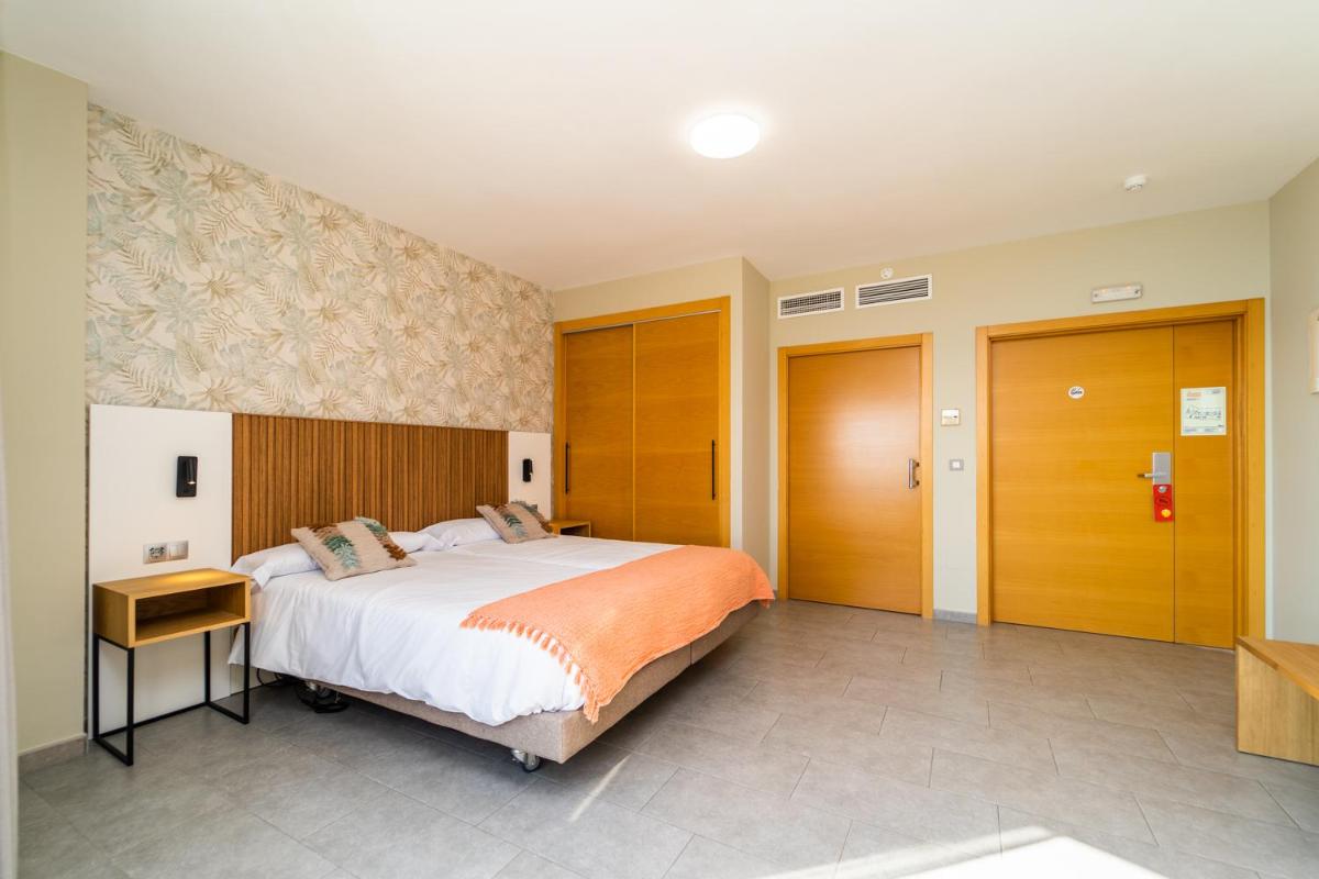 Cama o camas de una habitación en Vistamar Hotel Luxury Wellness By DLV -Adults Only-
