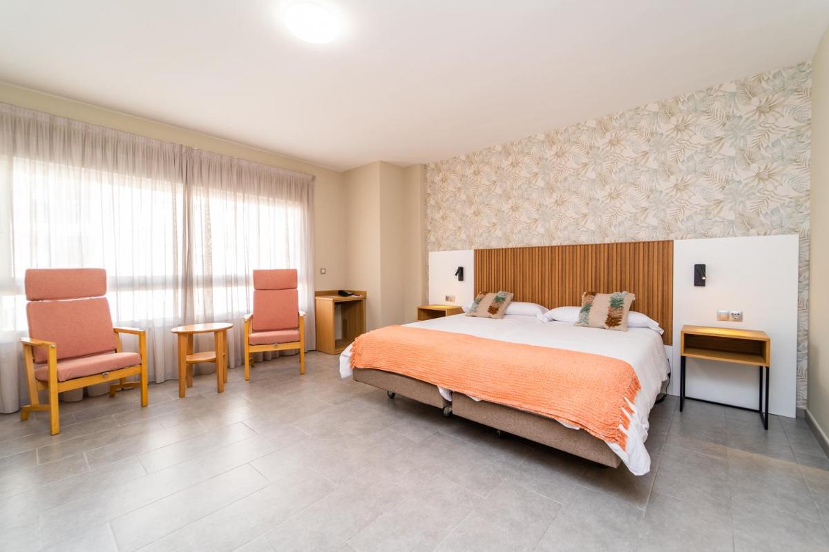 Cama o camas de una habitación en Vistamar Hotel Luxury Wellness By DLV -Adults Only-