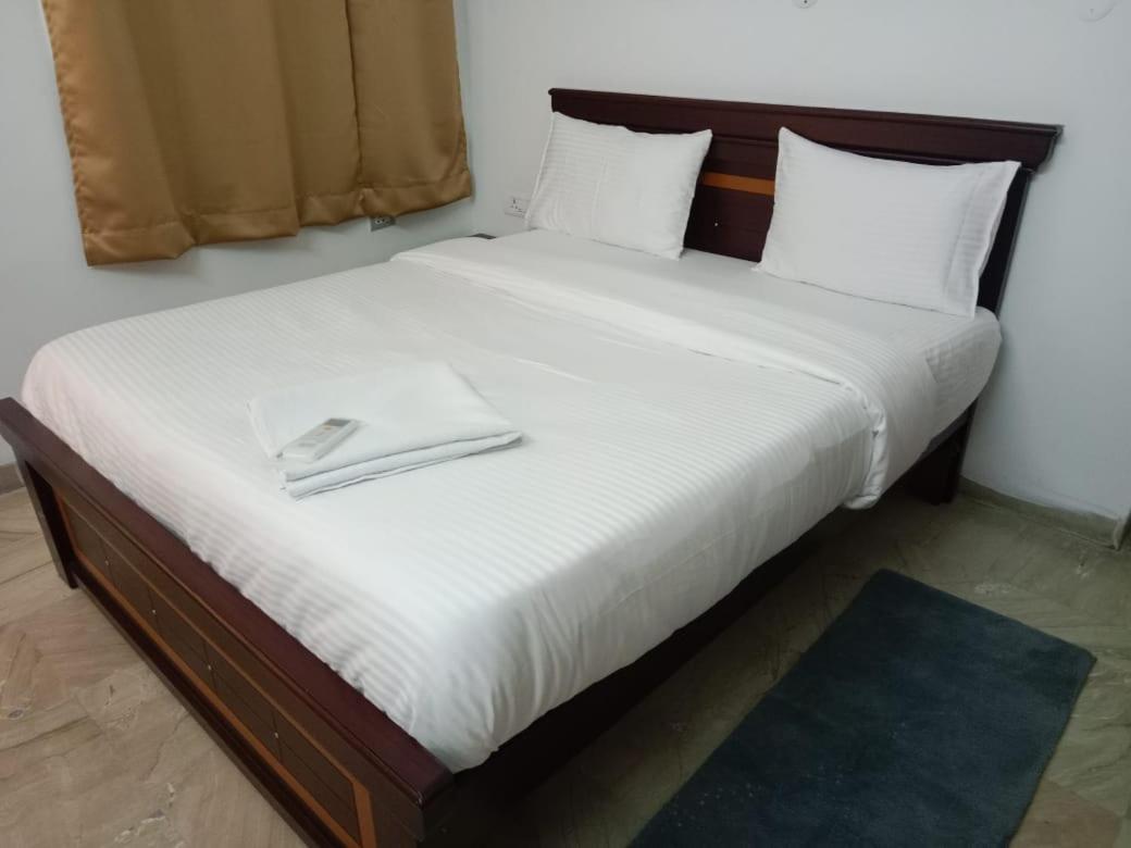 Suitetrails - Sv Orchid AC King size bed Room