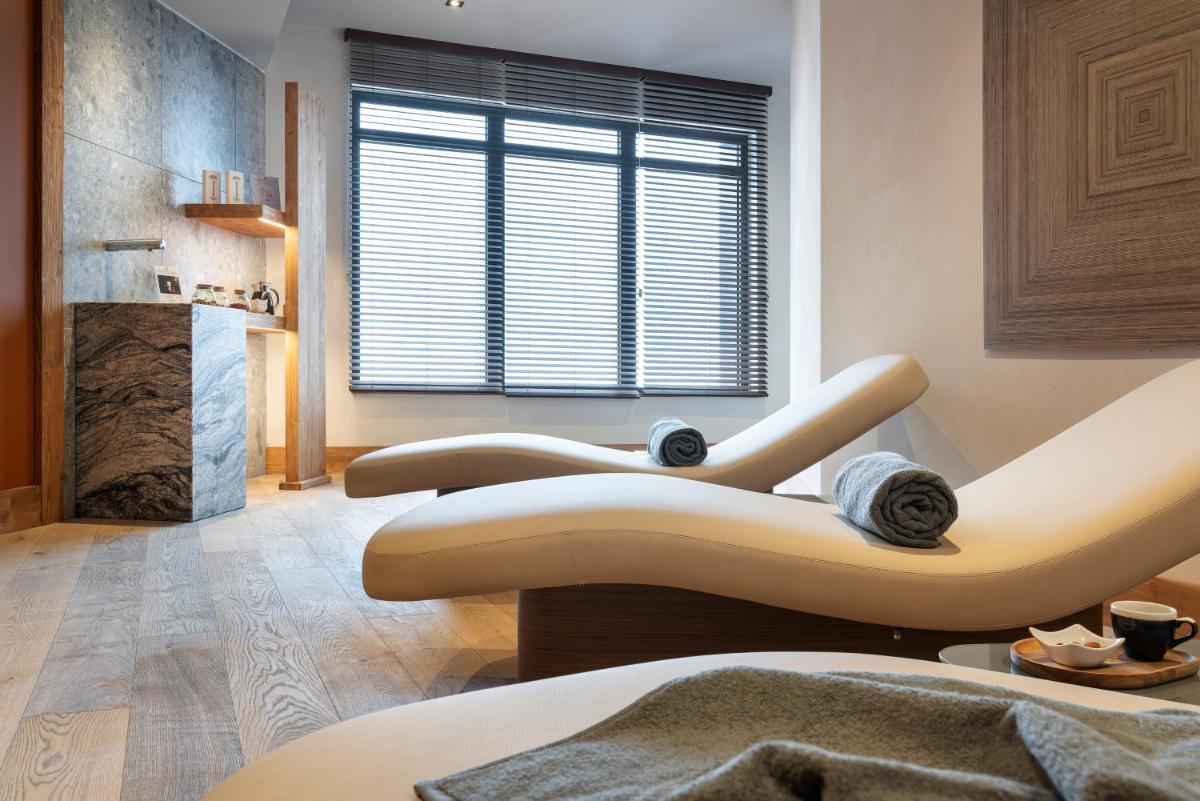 Coin salon dans l'établissement MGM Hôtels & Résidences - Résidence Le Hameau de l'Ours