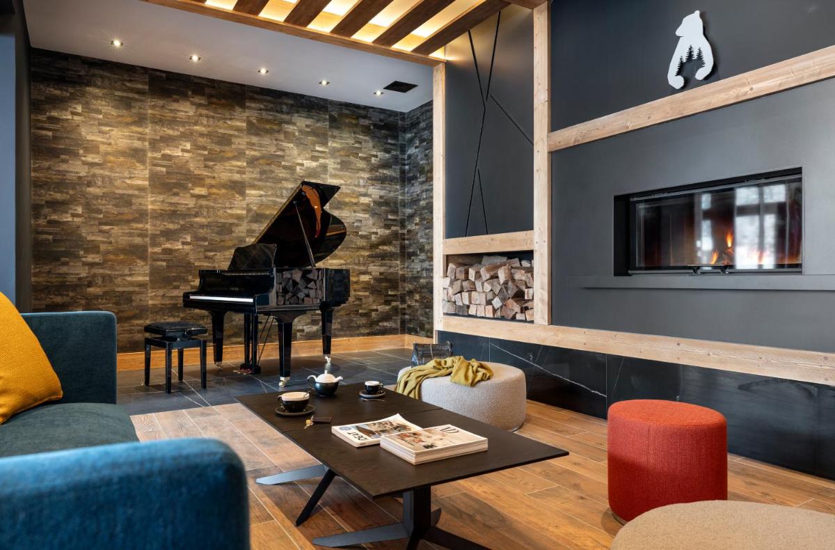 Coin salon dans l'établissement MGM Hôtels & Résidences - Résidence Le Hameau de l'Ours