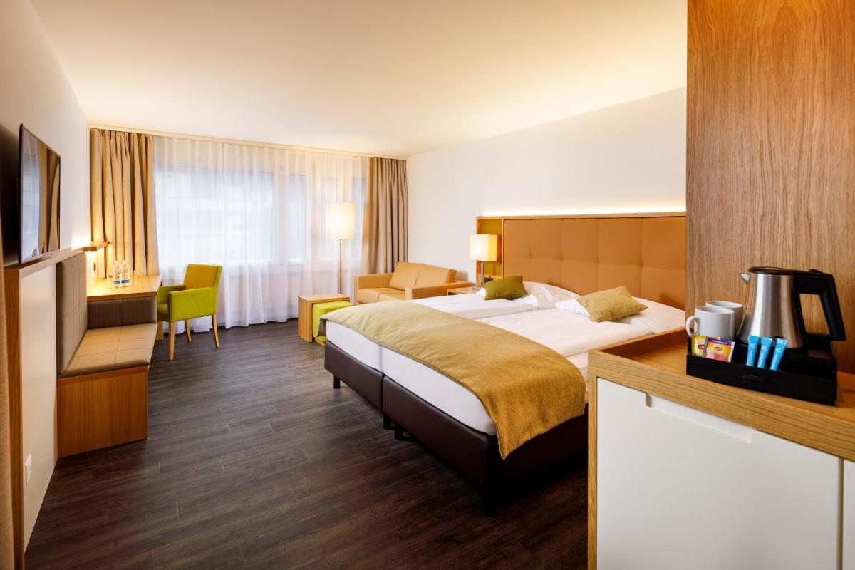 Ramada by Wyndham Baden Hotel du Parc - Housity