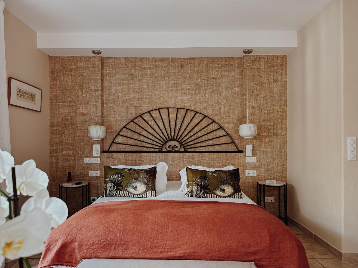 Un ou plusieurs lits dans un hébergement de l'établissement Hôtel La Dimora & Spa