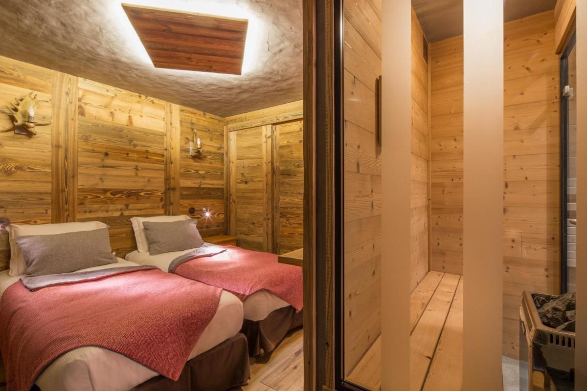 Un ou plusieurs lits dans un hébergement de l'établissement Les Grands Montets Hotel & Spa