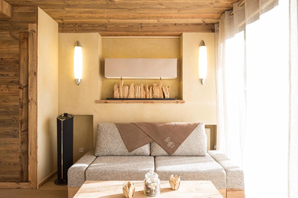 Un ou plusieurs lits dans un hébergement de l'établissement Les Grands Montets Hotel & Spa