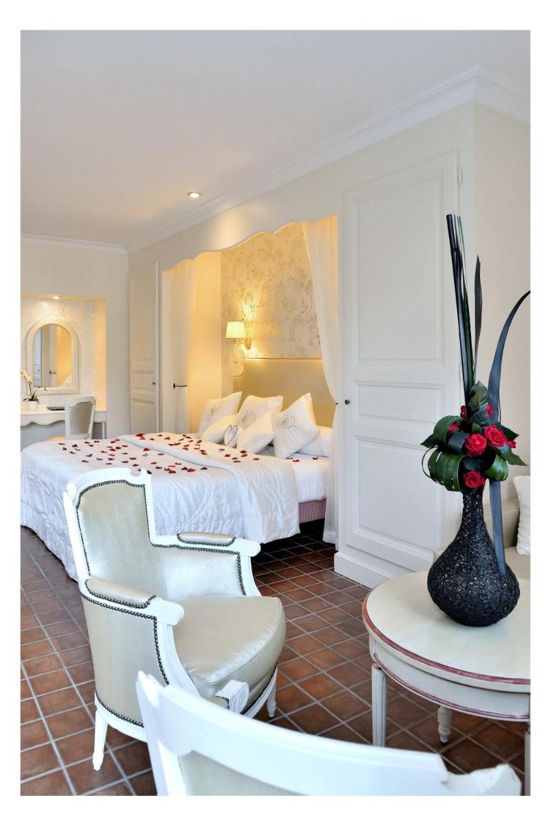 Coin salon dans l'établissement Auberge de Cassagne & Spa