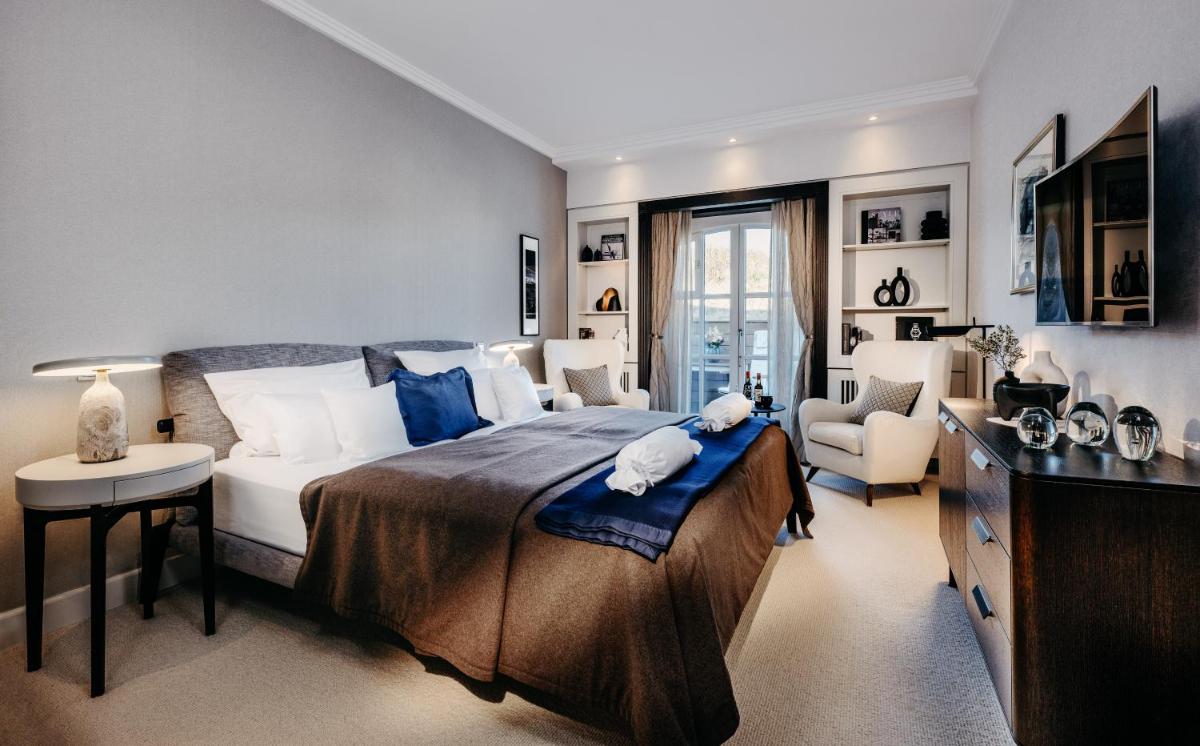 Ein Bett oder Betten in einem Zimmer der Unterkunft Söl'ring Hof