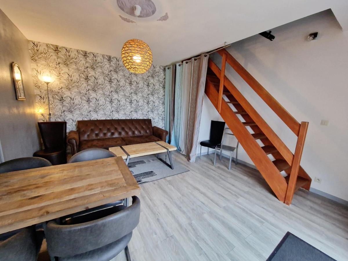 Coin salon dans l'établissement Les Terrasses de Saumur - Hôtel & Appartements - Restaurant & Spa (Logis)