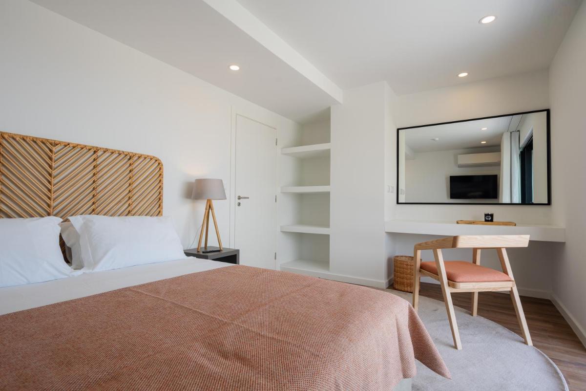 Uma cama ou camas num quarto em Alto do Forte