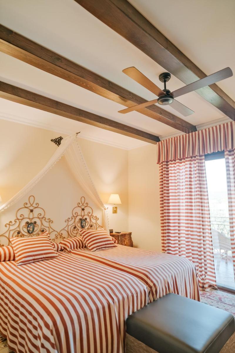 Cama o camas de una habitación en Rigat Park & Spa Hotel - Adults Recommended
