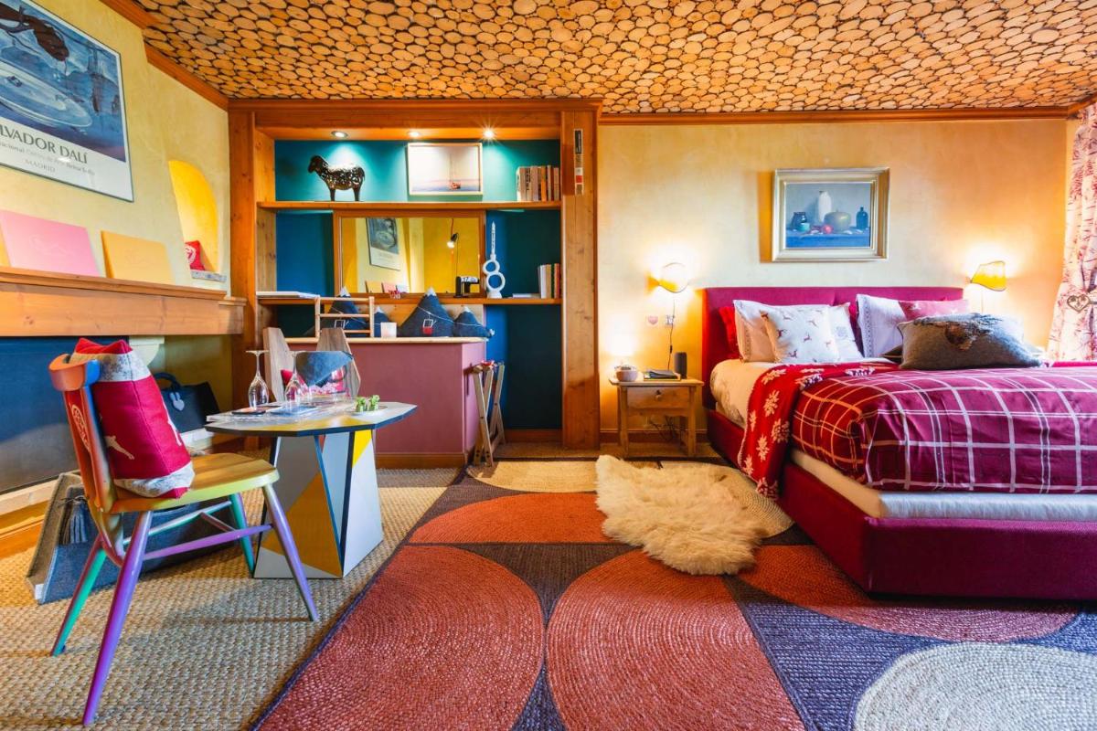 Coin salon dans l'établissement Magic Megève Bois
