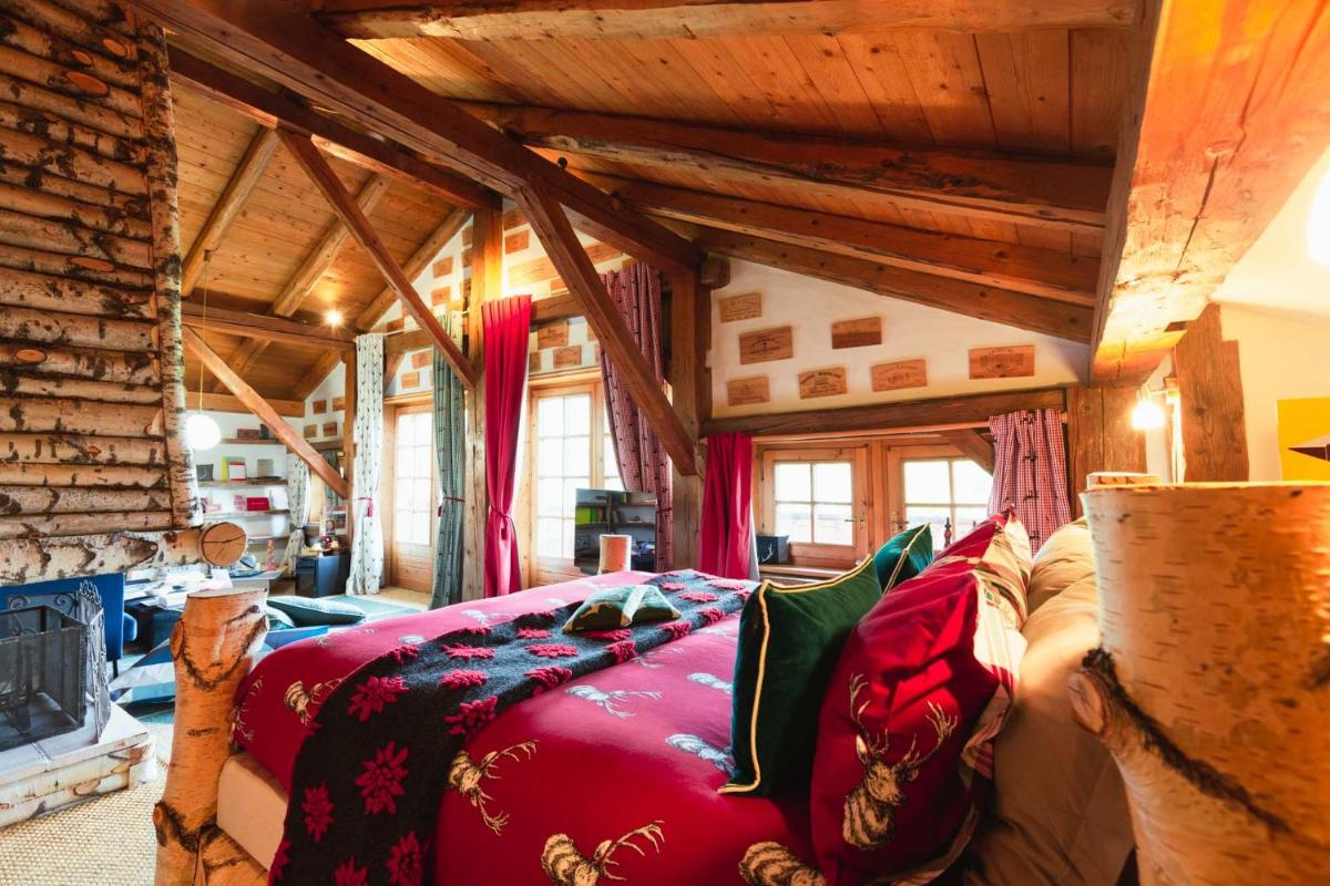 Coin salon dans l'établissement Magic Megève Bois