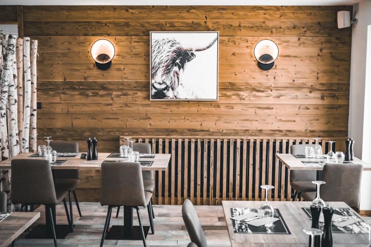 Restaurant ou autre lieu de restauration dans l'établissement Hôtel et Spa les Clarines