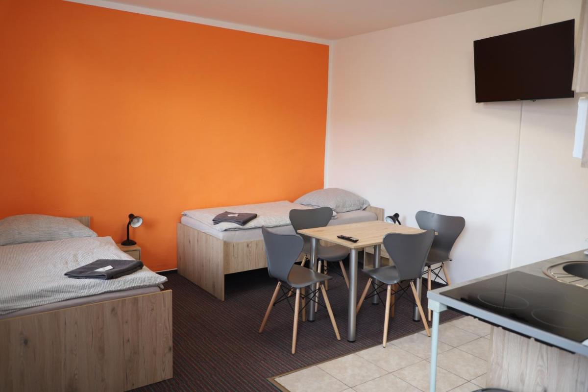Kolík Apartmány - Housity