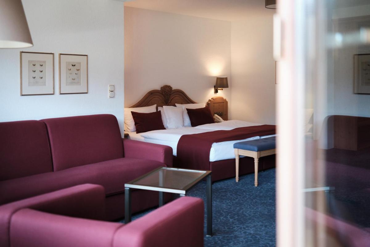 Ein Sitzbereich in der Unterkunft Hotel Traube Tonbach