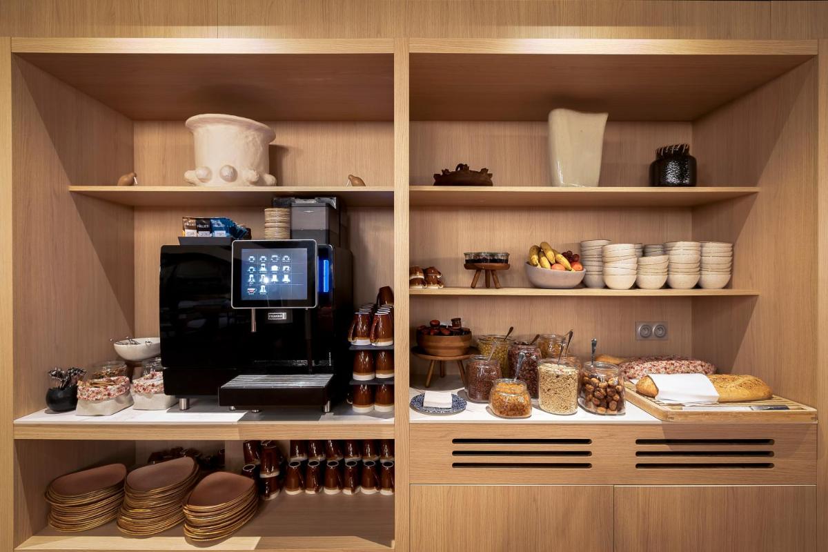 Cuisine ou kitchenette dans l'établissement Lykke Hôtel & Spa Chamonix - ex Mercure