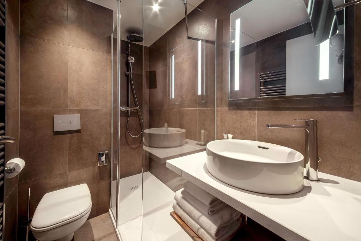 Salle de bains dans l'établissement Lykke Hôtel & Spa Chamonix - ex Mercure