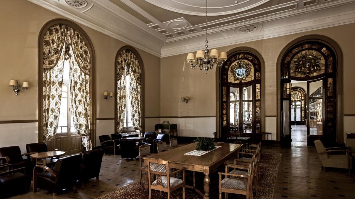 Uma área de estar em Curia Palace Hotel & Spa