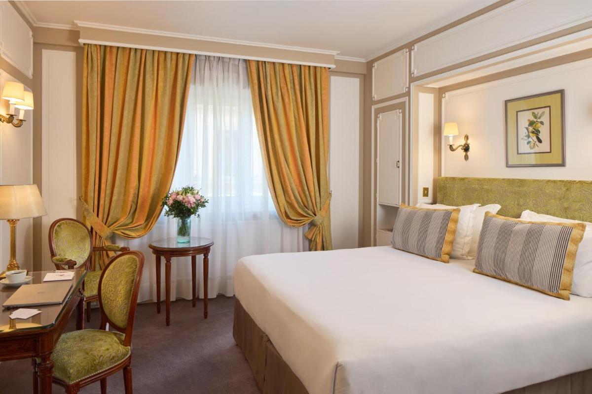 Un ou plusieurs lits dans un hébergement de l'établissement Majestic Hotel Spa - Champs Elysées