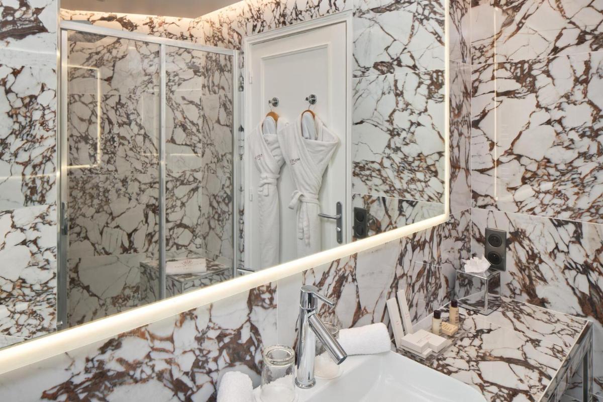 Salle de bains dans l'établissement Majestic Hotel Spa - Champs Elysées