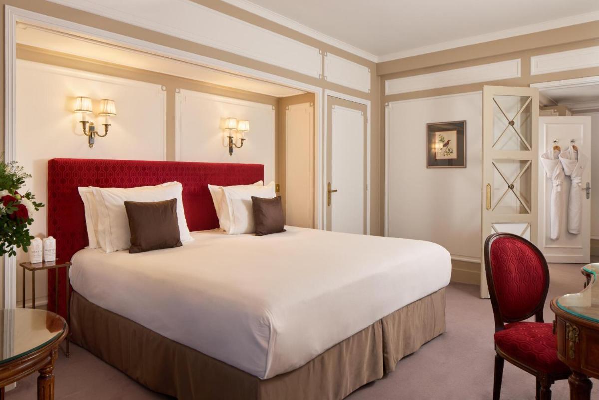 Un ou plusieurs lits dans un hébergement de l'établissement Majestic Hotel Spa - Champs Elysées