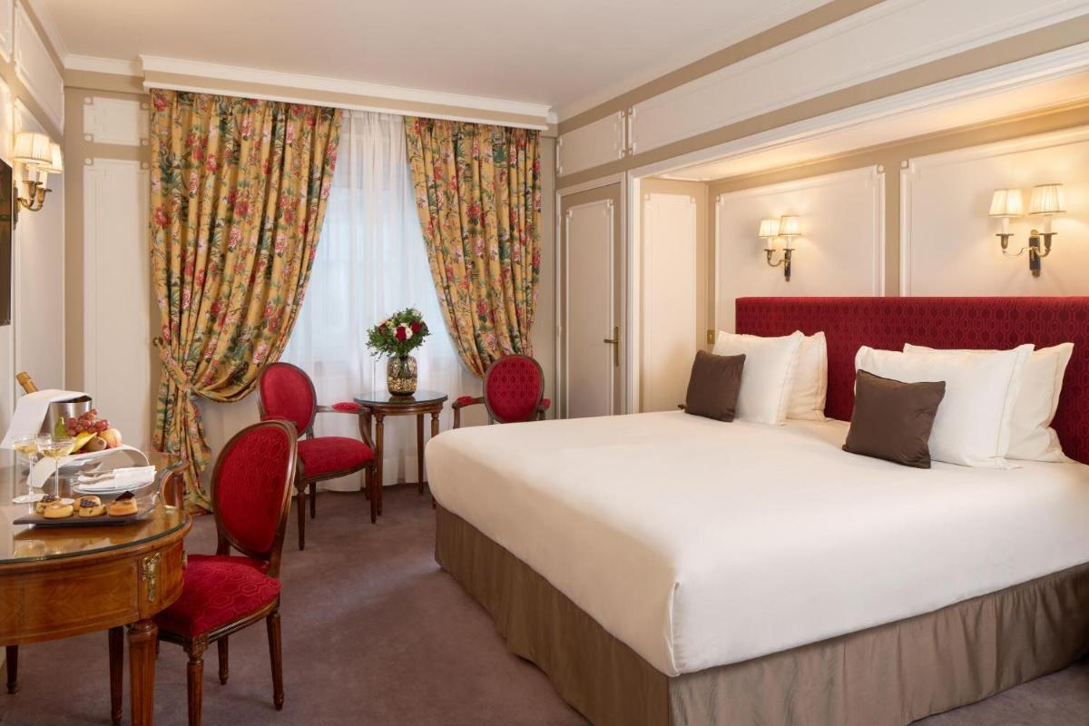 Un ou plusieurs lits dans un hébergement de l'établissement Majestic Hotel Spa - Champs Elysées