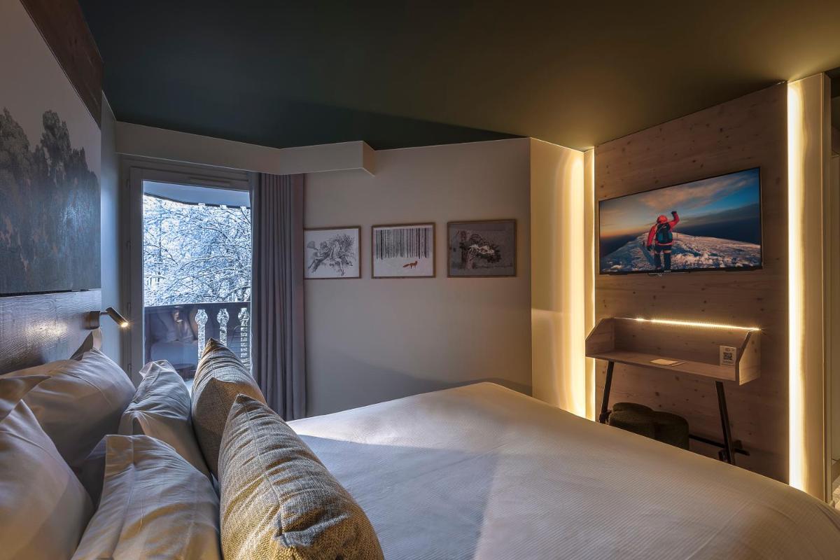 Un ou plusieurs lits dans un hébergement de l'établissement Lykke Hôtel & Spa Chamonix - ex Mercure