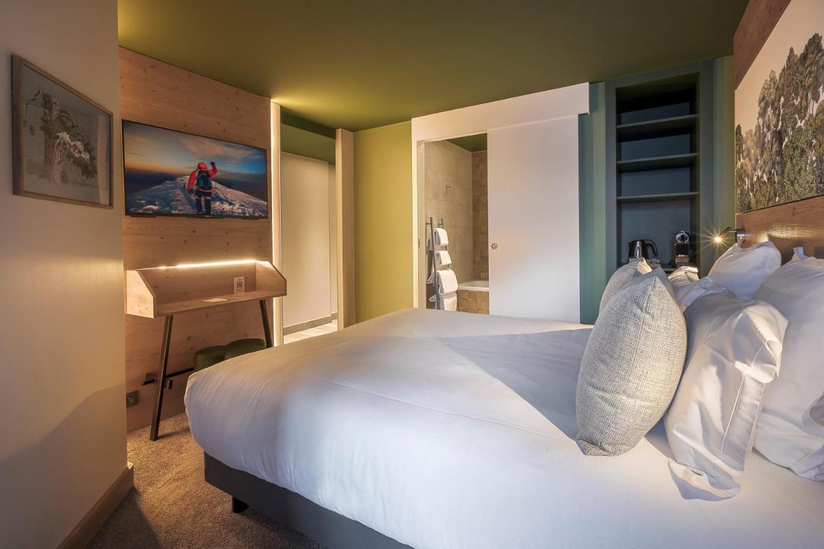 Un ou plusieurs lits dans un hébergement de l'établissement Lykke Hôtel & Spa Chamonix - ex Mercure