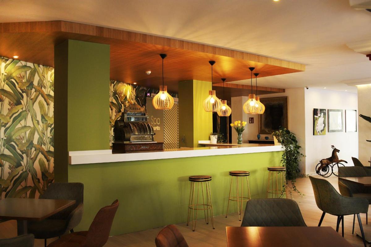 Un restaurante o sitio para comer en Hotel Morito