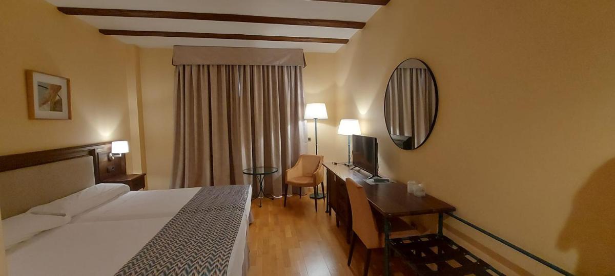 Cama o camas de una habitación en Hotel Spa Tudanca Aranda