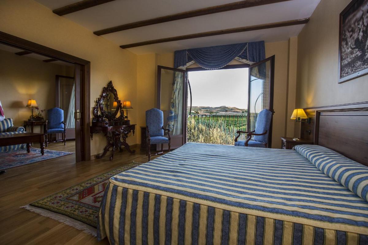 Cama o camas de una habitación en Hotel Spa Tudanca Aranda