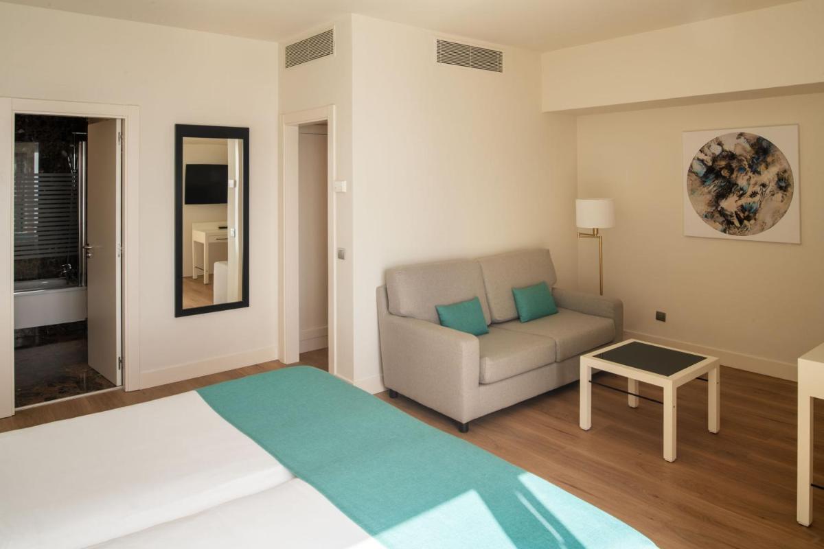 Cama o camas de una habitación en Arrecife Gran Hotel & Spa