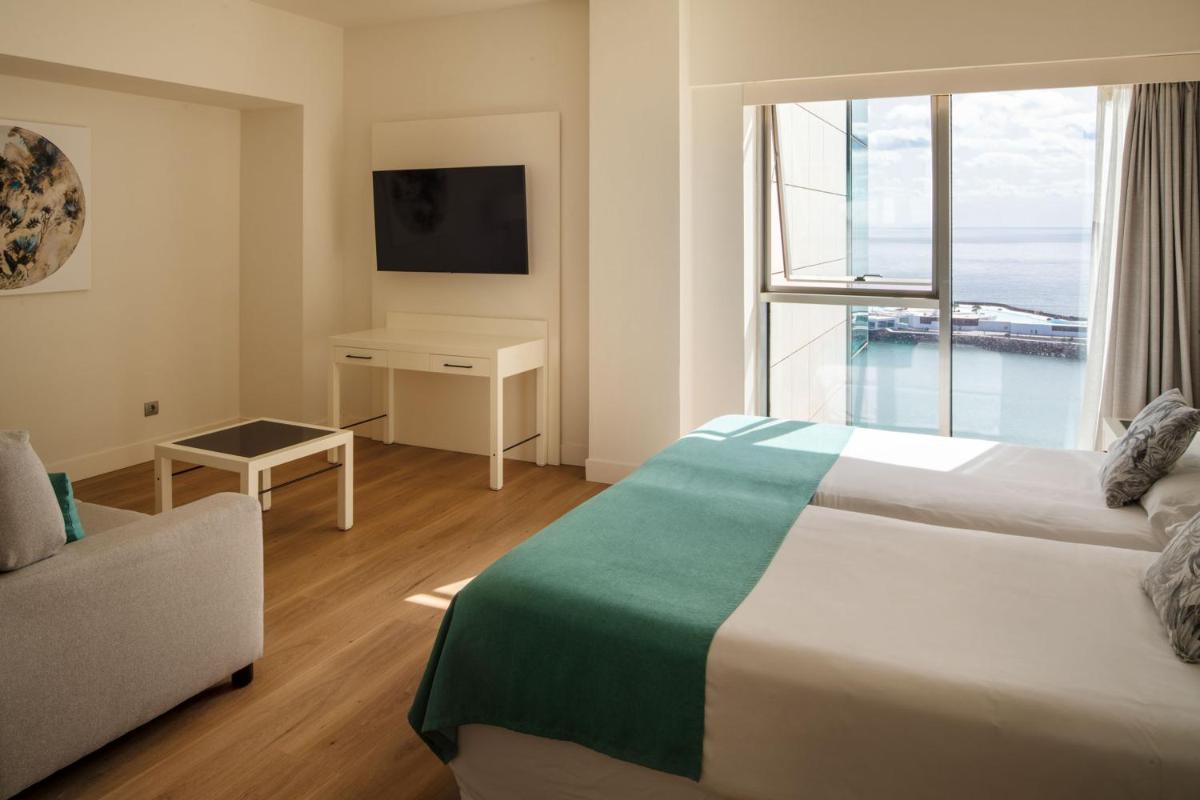 Cama o camas de una habitación en Arrecife Gran Hotel & Spa