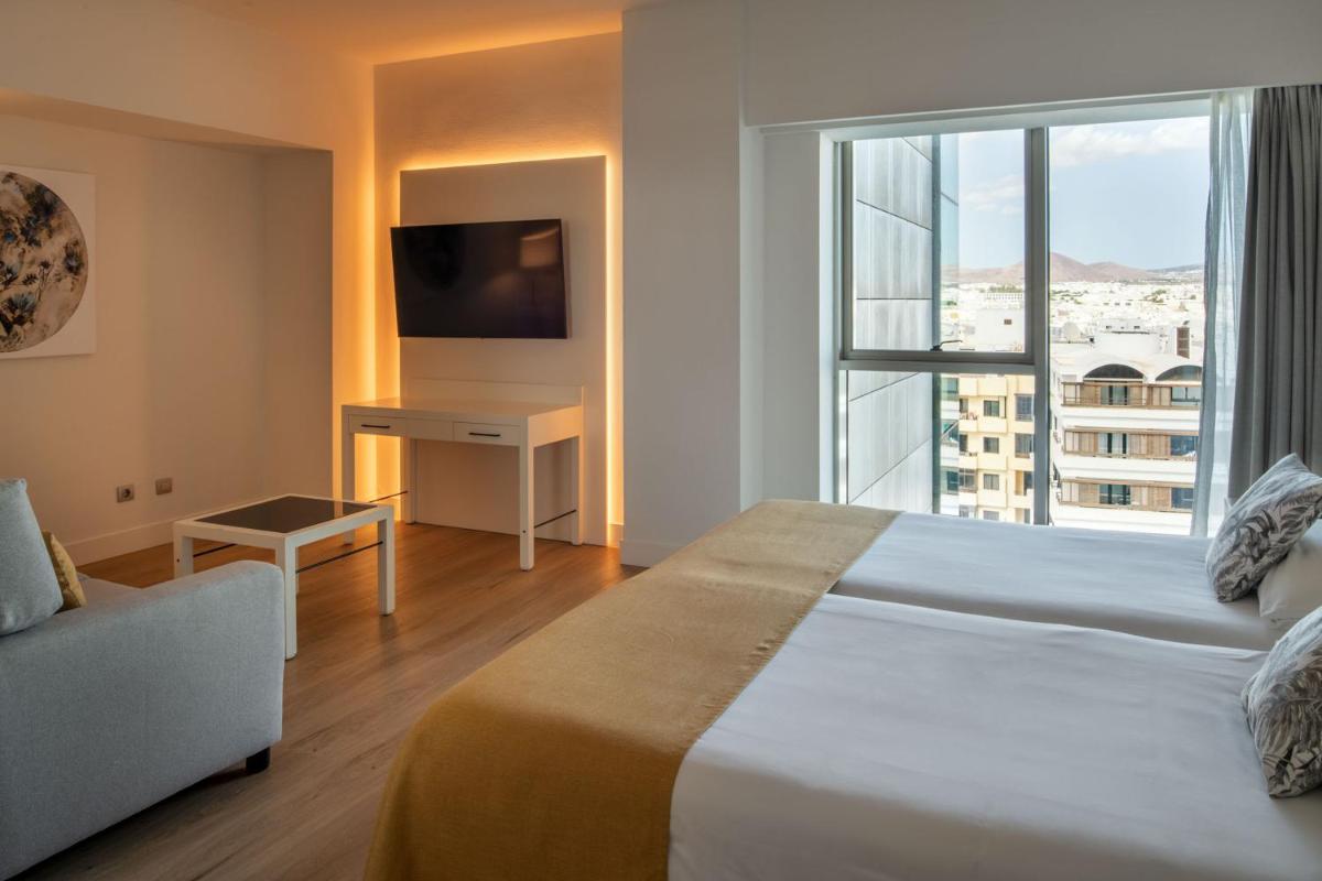 Cama o camas de una habitación en Arrecife Gran Hotel & Spa