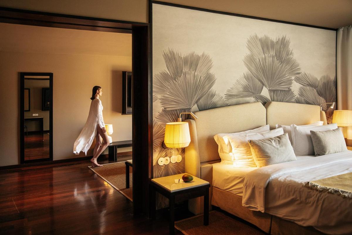 Uma cama ou camas num quarto em Domes Lake Algarve, Autograph Collection