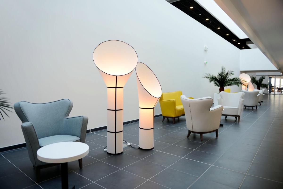 Coin salon dans l'établissement Appart'Hotel Odalys Nakâra