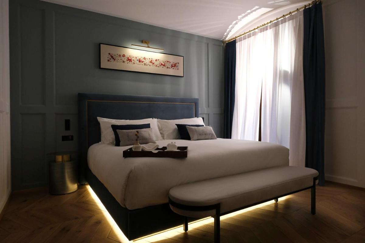 Cama o camas de una habitación en Eunice Hotel Gastronómico
