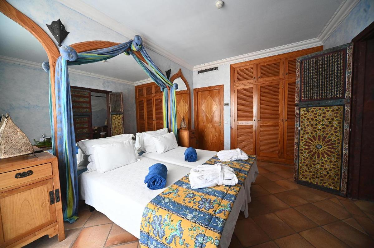 Uma cama ou camas num quarto em Boa Vista Hotel & Spa - Adults Only