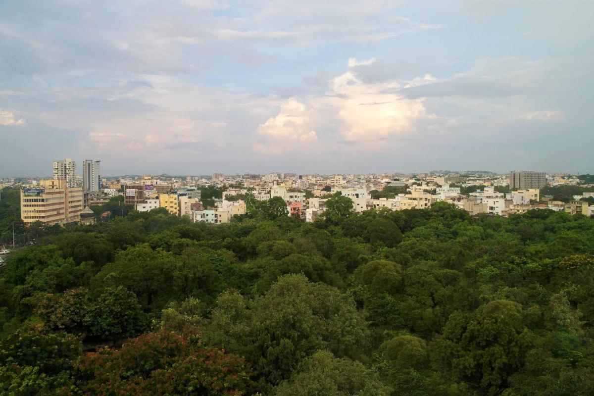 a view of a city with trees and buildings at Hyderabad Marriott Hotel & Convention Centre in Hyderabad