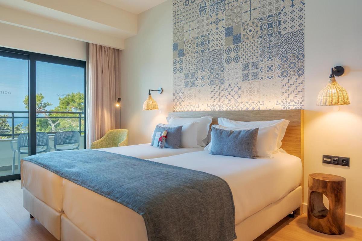 Uma cama ou camas num quarto em Sentido Galosol