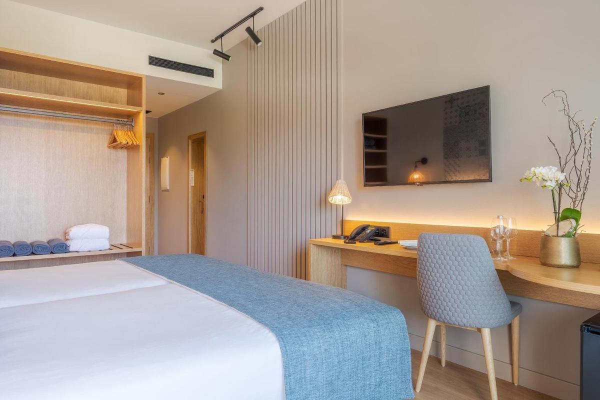 Uma cama ou camas num quarto em Sentido Galosol