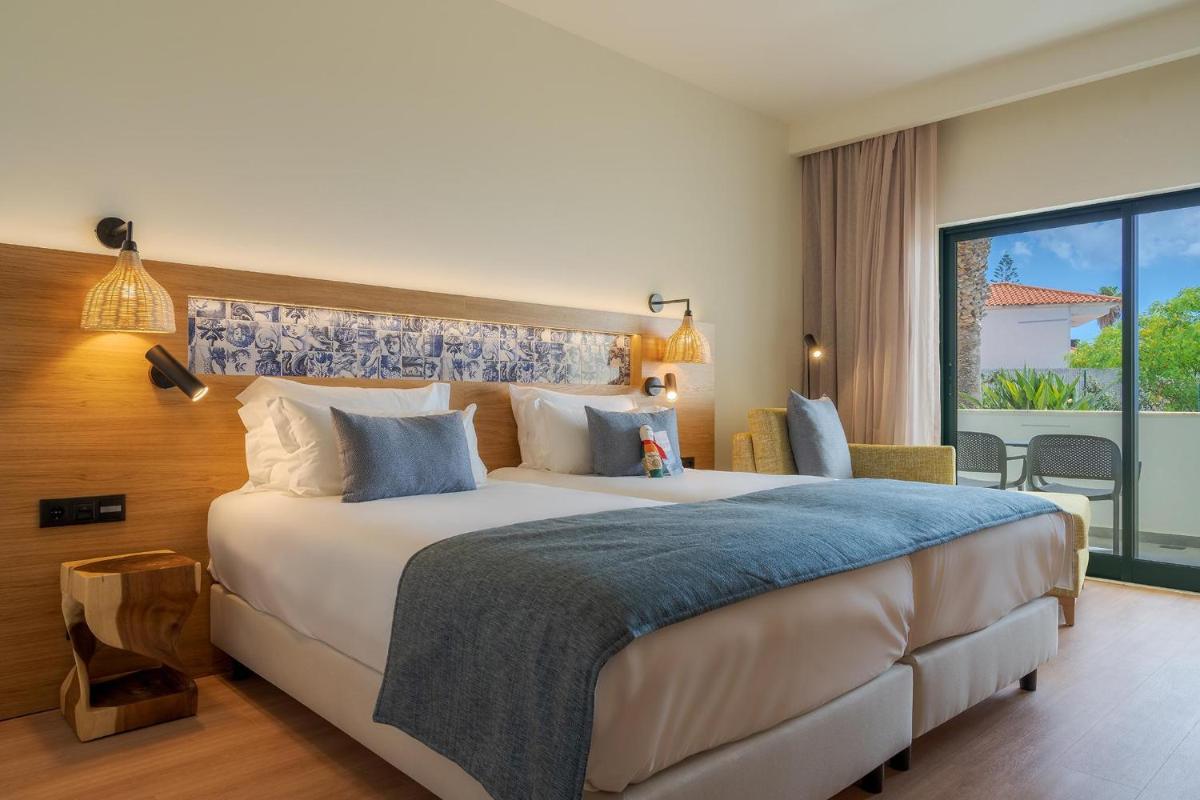 Uma cama ou camas num quarto em Sentido Galosol