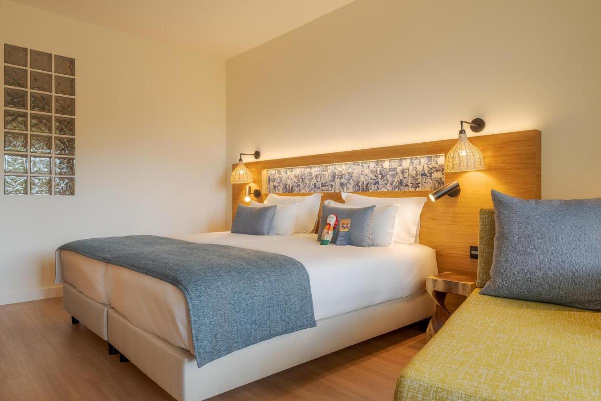 Uma cama ou camas num quarto em Sentido Galosol